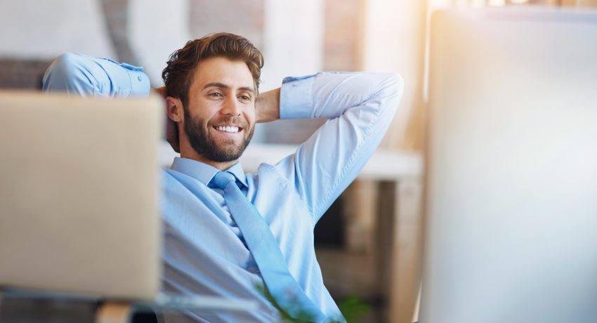 Confident man looking comfortable and dry in a modern office setting